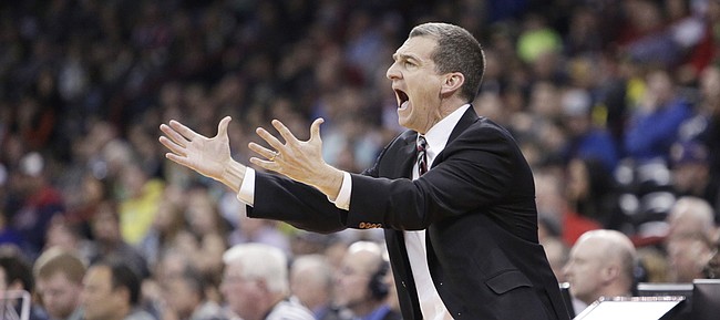 Maryland coach — and Kansas University alumnus — Mark Turgeon instructs his team during a 73-60 victory over Hawaii on Sunday in Spokane, Wash. The victory sent the Terps into the Sweet 16, where they’ll meet KU approximately 8:40 p.m. Thursday in Louisville, Ky.