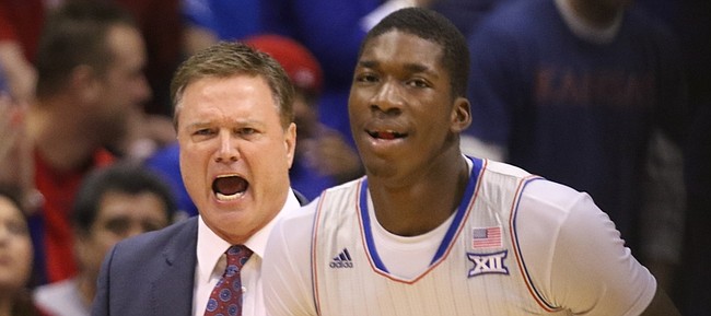 Kansas head coach Bill Self gets in the ear of Kansas forward Cheick Diallo (13) during the first half, Monday, Feb. 15, 2016 at Allen Fieldhouse.