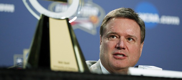 Kansas coach Bill Self answers a question near his Associated Press Coach of the Year trophy at a news conference at the NCAA Final Four college basketball tournament Thursday, March 31, 2016, in Houston. (AP Photo/David J. Phillip)