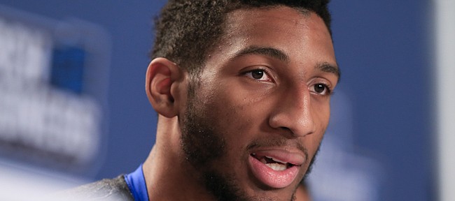 Kentucky's Marcus Lee speaks during a news conference prior to a second-round men's college basketball game in the NCAA Tournament in Des Moines, Iowa, Friday, March 18, 2016. Lee has decided to withdraw from the NBA Draft, but he will transfer away from UK.