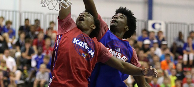 Red Team guard Devonte' Graham has his dunk stuffed at the rim by Blue Team guard Josh Jackson on Wednesday, June 15, 2016 at the Horejsi Athletic Center.