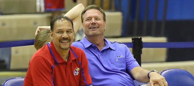 Kansas head coach Bill Self and assistant coach Kurtis Townsend watch with smiles during the campers vs. counselors scrimmage, Wednesday, June 8, 2016 at the Horejsi Athletic Center.