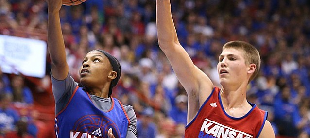 Kansas guard Aisia Robertson rolls in for a shot during Late Night in the Phog on Saturday, Oct. 1, 2016 at Allen Fieldhouse.