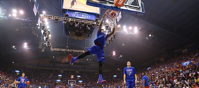 Kansas newcomer Josh Jackson throws down a dunk for the crowd during Late Night in the Phog on Saturday, Oct. 1, 2016 at Allen Fieldhouse.