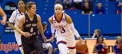 Kansas guard Jessica Washington (3) brings the ball up the court during an exhibition game against Fort Hays State on Sunday in Allen Fieldhouse.