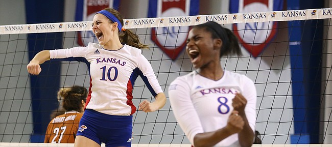 Kansas middle blocker Tayler Soucie (10) and Kansas right side hitter Kelsie Payne (8) celebrate a point during the fifth set on Saturday, Oct. 29, 2016 at the Horejsi Center.