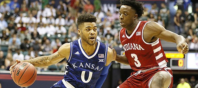 Kansas guard Frank Mason III (0) drives against Indiana forward OG Anunoby (3) during the first half of the Armed Forces Classic at Stan Sheriff Center, on Friday, Nov. 11, 2016 in Honolulu, Hawaii.
