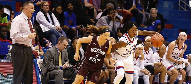 Kansas guard Jayde Christopher (20) steals the ball from Missouri State player Lexi Hughes in front of the KU bench during the Jayhawks game against the Missouri State Lady Bears Sunday, Nov. 13, 2016 at Allen Field House. 