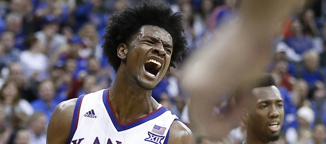 Kansas guard Josh Jackson (11) goes wild after a dunk during the second half, Tuesday, Nov. 22, 2016 during the championship game of the CBE Classic at Sprint Center.