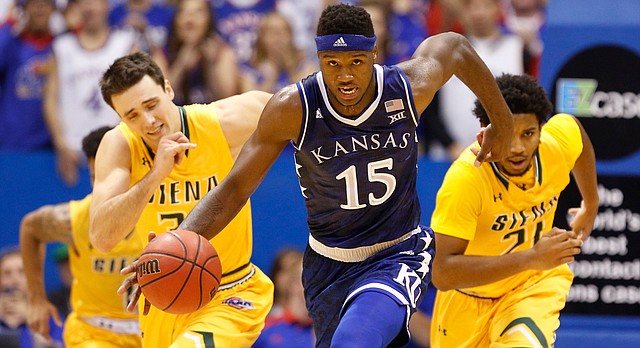 Kansas forward Carlton Bragg Jr. (15) charges up the court with the ball during the second half, Friday, Nov. 18, 2016 at Allen Fieldhouse.