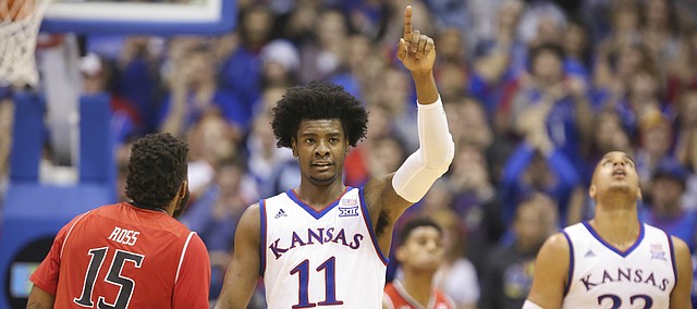 Kansas guard Josh Jackson (11) signals the ball going the Jayhawks' way after a Texas Tech turnover during the second half, Saturday, Jan. 7, 2017 at Allen Fieldhouse.
