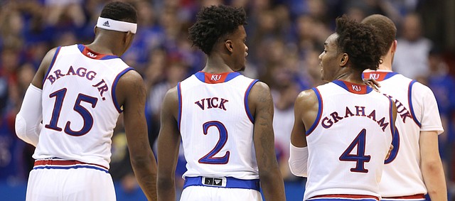 Kansas players converse during a break from action in the second half, Saturday, Jan. 7, 2017 at Allen Fieldhouse.