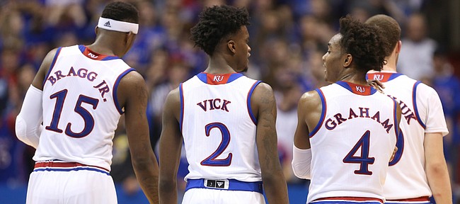 Kansas players converse during a break from action in the second half, Saturday, Jan. 7, 2017 at Allen Fieldhouse.