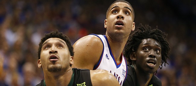 Kansas forward Landen Lucas (33) fights for position with Baylor guard Ishmail Wainright, front, and Baylor forward Johnathan Motley during the second half, Wednesday, Feb. 1, 2017 at Allen Fieldhouse.