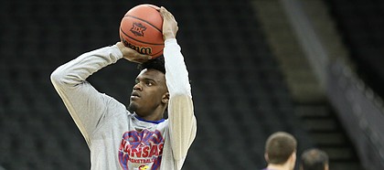 Kansas guard Lagerald Vick puts up a shot during a practice on Wednesday, March 8, 2017 at Sprint Center.