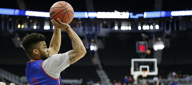 Kansas guard Frank Mason III (0) puts up a three pointer during a day of practices and press conferences prior to Thursday's game at Sprint Center in Kansas City, Mo.