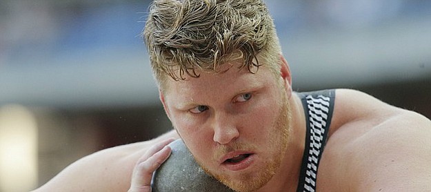 Ryan Crouser of the United States competes in the men's shot put event at the IAAF Diamond League athletics meeting at Stade de France stadium in Saint Denis, north of Paris, France, Saturday Aug. 27, 2016. (AP Photo/Michel Euler)
