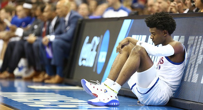 Kansas guard Josh Jackson (11) waits to check back into the game after sitting with two early fouls during the first half on Saturday, March 25, 2017 at Sprint Center.