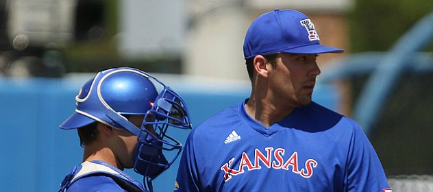 Kansas University starter Jackson Goddard and catcher Michael Tinsley talk during the third inning as the Texas Tech runs begin to pile up on Saturday, May 7, 2016 at Hoglund Ballpark.
