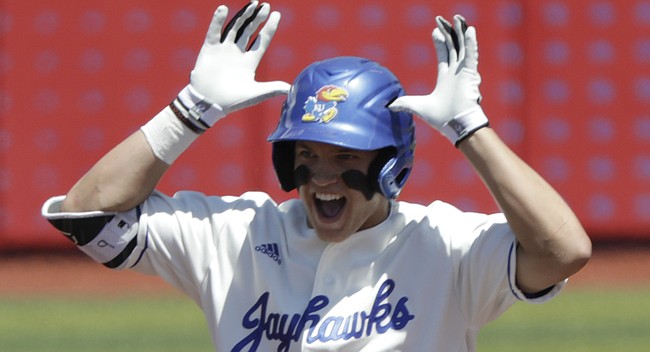 Kansas freshman James Cosentino celebrates a standup double during the Jayhawks' game Saturday, May 13, against the Kansas State Wildcats