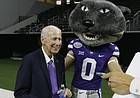 Kansas State head football coach Bill Snyder smiles beside team mascot Willie the Wildcat after speaking to reporters during the Big 12 NCAA college football media day in Frisco, Texas, Tuesday, July 18, 2017. (AP Photo/LM Otero)

