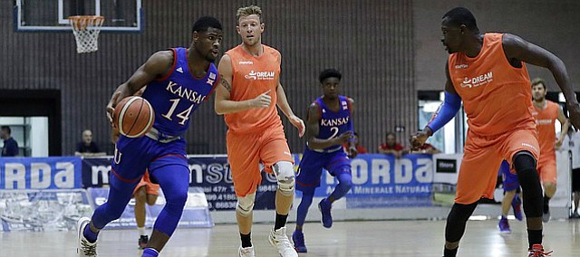Kansas guard Malik Newman, left, in action during an exhibition game between KU and Italy All Star A2, in Seregno, near Milan, Italy, Sunday, Aug. 6, 2017. 