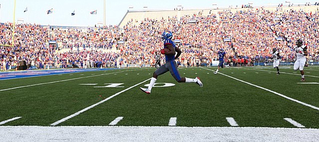 Kansas junior receiver Steven Sims Jr. races down the field for a 77-yard touchdown in the first quarter of Saturday's season opener against Southeast Missouri State at Memorial Stadium. 