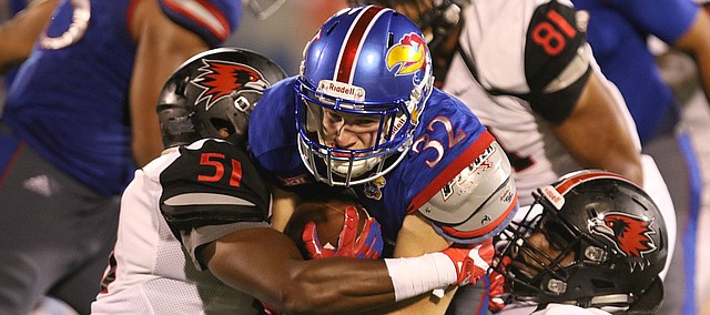 Kansas running back Reese Randall (32) gets a carry during the fourth quarter on Saturday, Sept. 2, 2017 at Memorial Stadium.