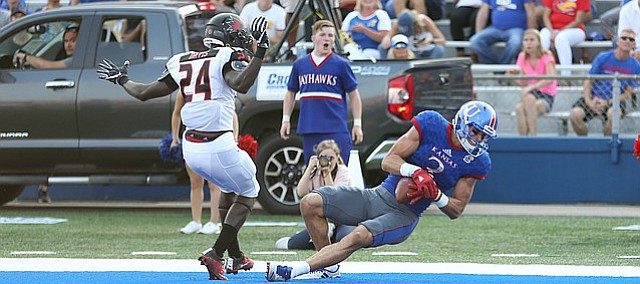 Kansas wide receiver Chase Harrell (3) pulls in an acrobatic catch in the end zone during the first quarter on Saturday, Sept. 2, 2017 at Memorial Stadium.