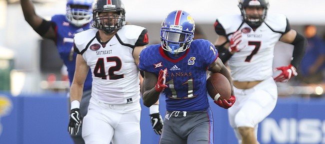 Kansas wide receiver Steven Sims Jr. (11) tears up the sideline on a touchdown run during the first quarter on Saturday, Sept. 2, 2017 at Memorial Stadium.