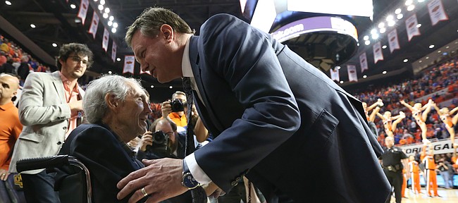 Kansas head coach Bill Self gives his well wishes to legendary Oklahoma State head coach Eddie Sutton following the Jayhawks' 90-85 win over the Cowboys, Saturday, March 4, 2017 at Gallagher-Iba Arena. 