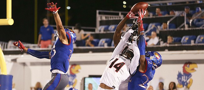 Several Jayhawks get up to bat down an end zone pass to Southeast Missouri wide receiver Trevon Billington (14) during the fourth quarter on Saturday, Sept. 2, 2017 at Memorial Stadium.