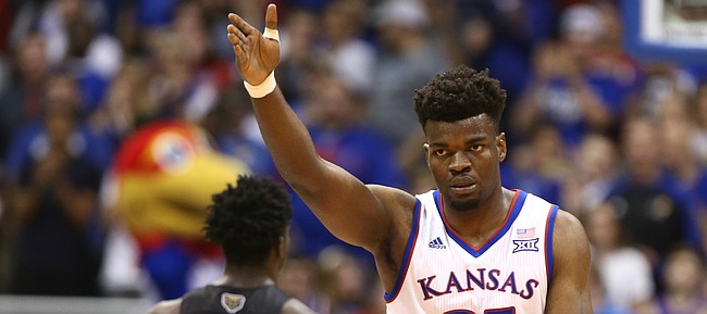 Kansas center Udoka Azubuike (35) signals the ball going the Jayhawks' direction after an Oakland turnover during the first half on Friday, Nov. 24, 2017 at Allen Fieldhouse.