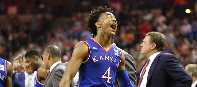 Kansas guard Devonte' Graham (4) lets out a roar during a break in action in the second half on Friday, Dec. 29, 2017 at Frank Erwin Center in Austin, Texas.