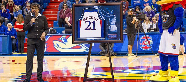 Adrian Mitchell speaks to the Allen Fieldhouse crowd on Sunday, Jan. 28, 2018 during her jersey retirement ceremony at halftime of KU's game against Kansas State.