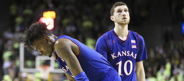 Kansas guard Lagerald Vick (2) and Kansas guard Sviatoslav Mykhailiuk (10) show their frustration following a late foul against the Jayhawks with little time remaining in the game, Saturday, Feb. 11, 2018 at Ferrell Center in Waco, Texas.