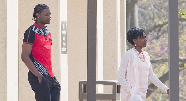 In this file photo from April 12, 2017, former University of Kansas basketball player Josh Jackson and his mother, Apples Jones, are pictured outside of the Douglas County Courthouse.