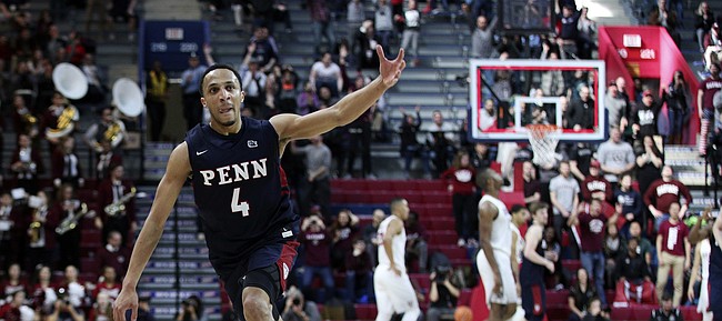 Pennsylvania's Darnell Foreman reacts to his three-point shot to end the first half of an NCAA college basketball championship game in the Ivy League Tournament against the Harvard, Sunday, March 11, 2018, in Philadelphia. (AP Photo/Chris Szagola)