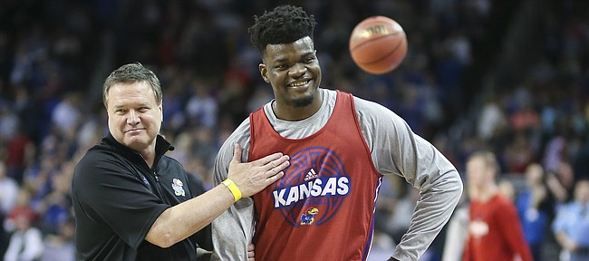 Kansas head coach Bill Self gives a pat on the chest to Kansas center Udoka Azubuike (35) at the conclusion of the Jayhawks' practice on Wednesday, March 14, 2018 at Intrust Bank Arena in Wichita, Kan.