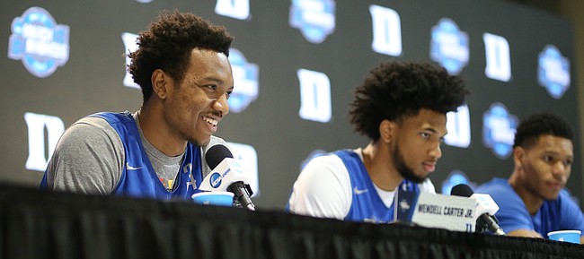 Duke forward Wendell Carter Jr., left, Duke forward Marvin Bagley III and Duke guard Trevon Duval take questions from reporters during a press conference on Saturday, March 24, 2018 at CenturyLink Center in Omaha, Neb.