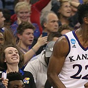 Kansas forward Silvio De Sousa (22) pumps his fists as the Jayhawks begin to solidify the victory during overtime, Sunday, March 25, 2018 at CenturyLink Center in Omaha, Neb.