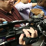 Kansas center Udoka Azubuike (35) is surrounded by media members in the team locker room on Thursday, March 29, 2018 at the Alamodome in San Antonio, Texas.