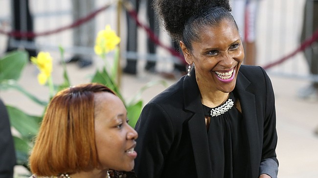 Former Kansas great and Harlem Globetrotter Lynette Woodard heads in for the Naismith Memorial Basketball Hall of Fame induction ceremony on Friday, Sept. 8 2017 at Symphony Hall in Springfield, Massachusetts.