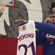 Kansas senior Devonte’ Graham auctions off a Clay Young jersey during a timeout in the Kansas Barnstormers game on Saturday, April 28, 2018 at Lansing High School.