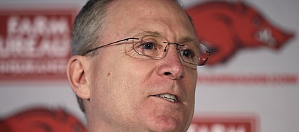FILE - In this Sept. 15, 2014, file photo, former University of Arkansas athletic director Jeff Long speaks during a news conference in Little Rock, Ark. Long was named the new athletic director at the University of Kansas, on July 5, 2018. (AP Photo/Danny Johnston, File)