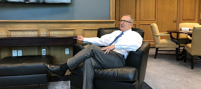 New Kansas athletic director Jeff Long, pictured here during his first day on the job on Aug. 1, 2018, hosted a small gathering with media members in his office to discuss, among other things, football, fund-raising and his adjustment to life in Lawrence. 
