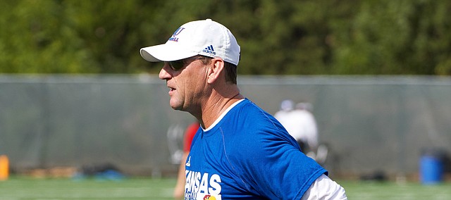 Kansas football coach David Beaty observes drills during practice on Aug. 4, 2018.