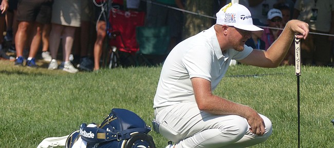 Former KU All-American golfer Ryan Vermeer gets a read on his putt Friday, Aug. 13, 2018 on the fifth green at Bellerive Country Club in St. Louis, site of the 100th PGA Championship
