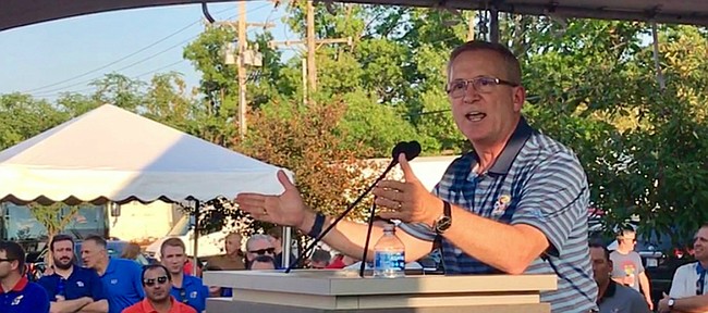 University of Kansas athletic director Jeff Long addresses fans at the KU Kickoff at Corinth Square, on Aug. 17, 2018, in Prairie Village.