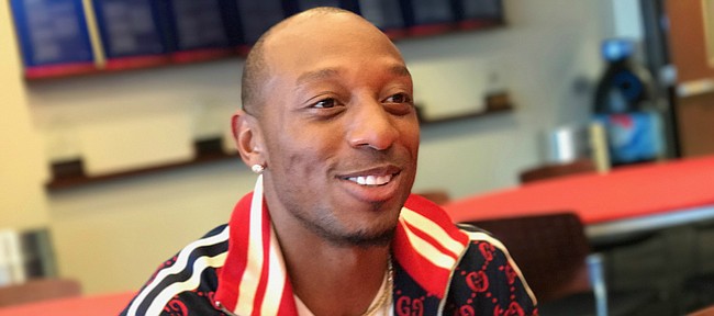 Denver Broncos cornerback and former standout University of Kansas defensive back Chris Harris Jr. speaks with reporters on Aug. 31, 2018, the day before his name was officially added to the KU football Ring of Honor inside Kansas David Booth Memorial Stadium.